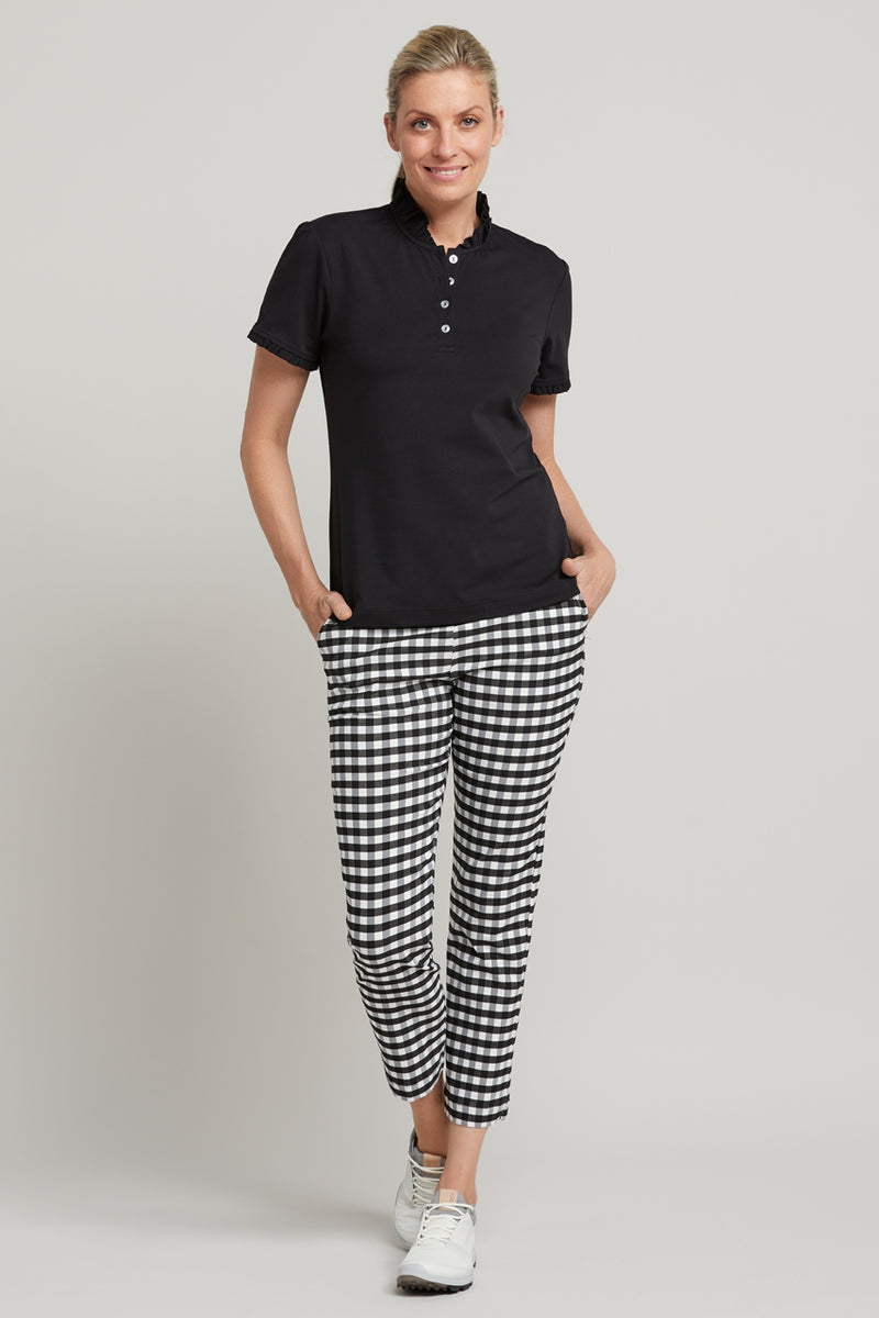 Ladies black short sleeve ruffle golf top