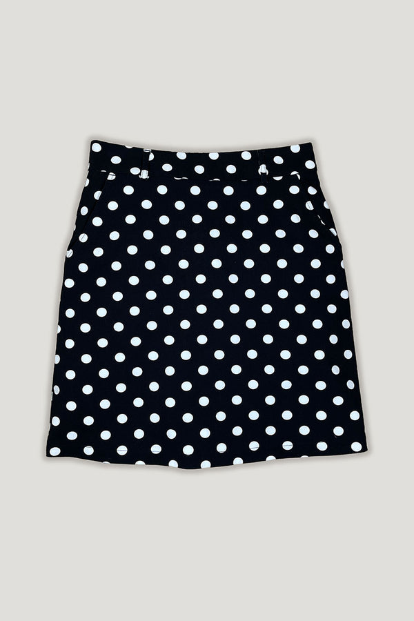 Women's black and white spot longer length golf skort