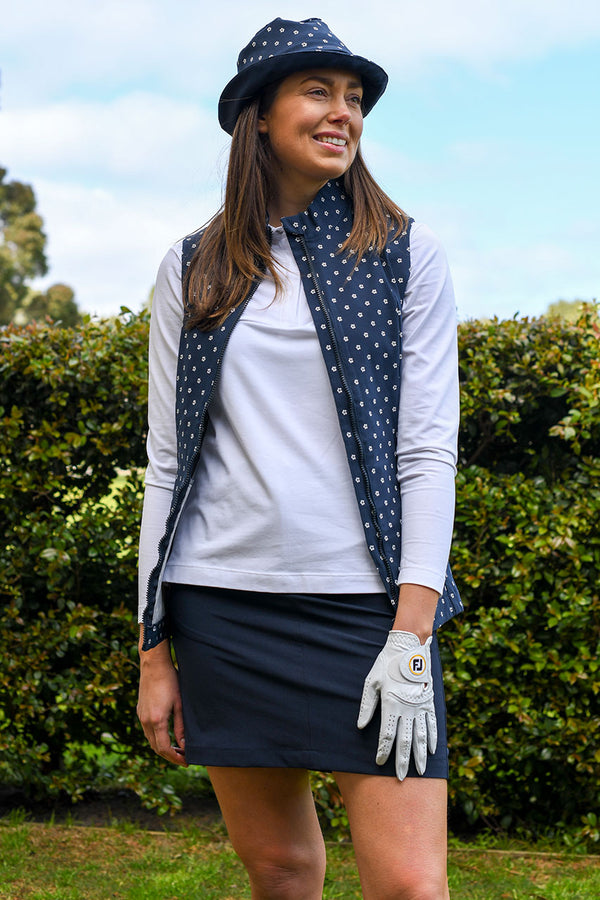 womens navy straight golf skirt and floral vest